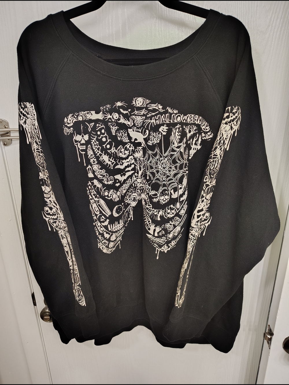 torrid Black Pullover Sweatshirt with White Halloween Skull & Web Graphic